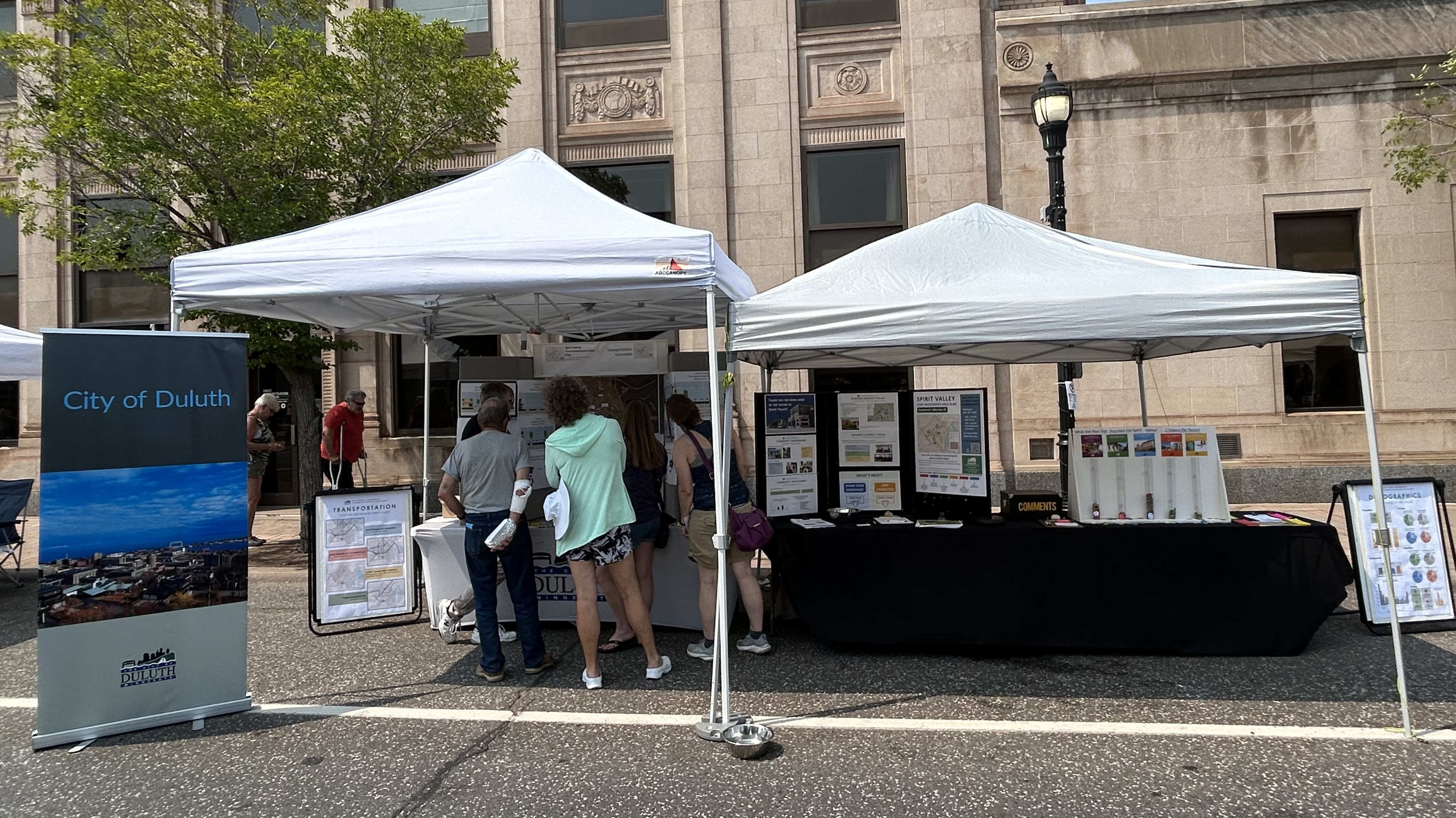 A photo of the City's booth on Grand Ave. during Spirit Valley Days 2025. The booth provided an opportunity to connect with the public and gain input about the Sprit Valley Plan.